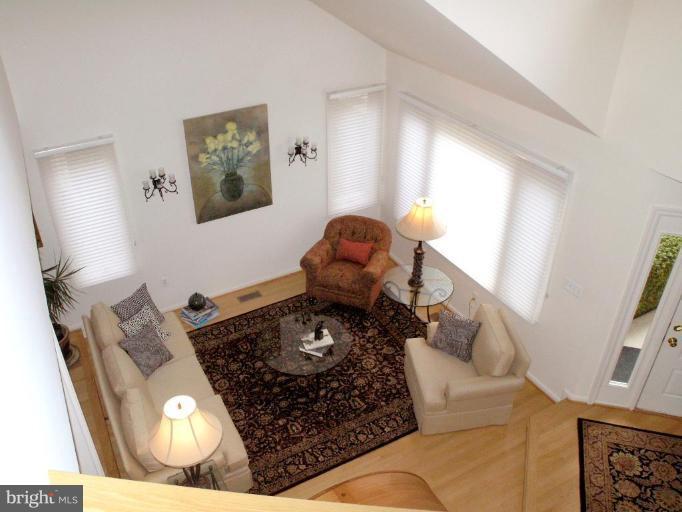 11200 Center Post Court Reston, VA 20194 - Photo 28 of 30 a living room with furniture and a rug
