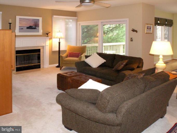 11200 Center Post Court Reston, VA 20194 - Photo 6 of 30 a living room with furniture and a fireplace