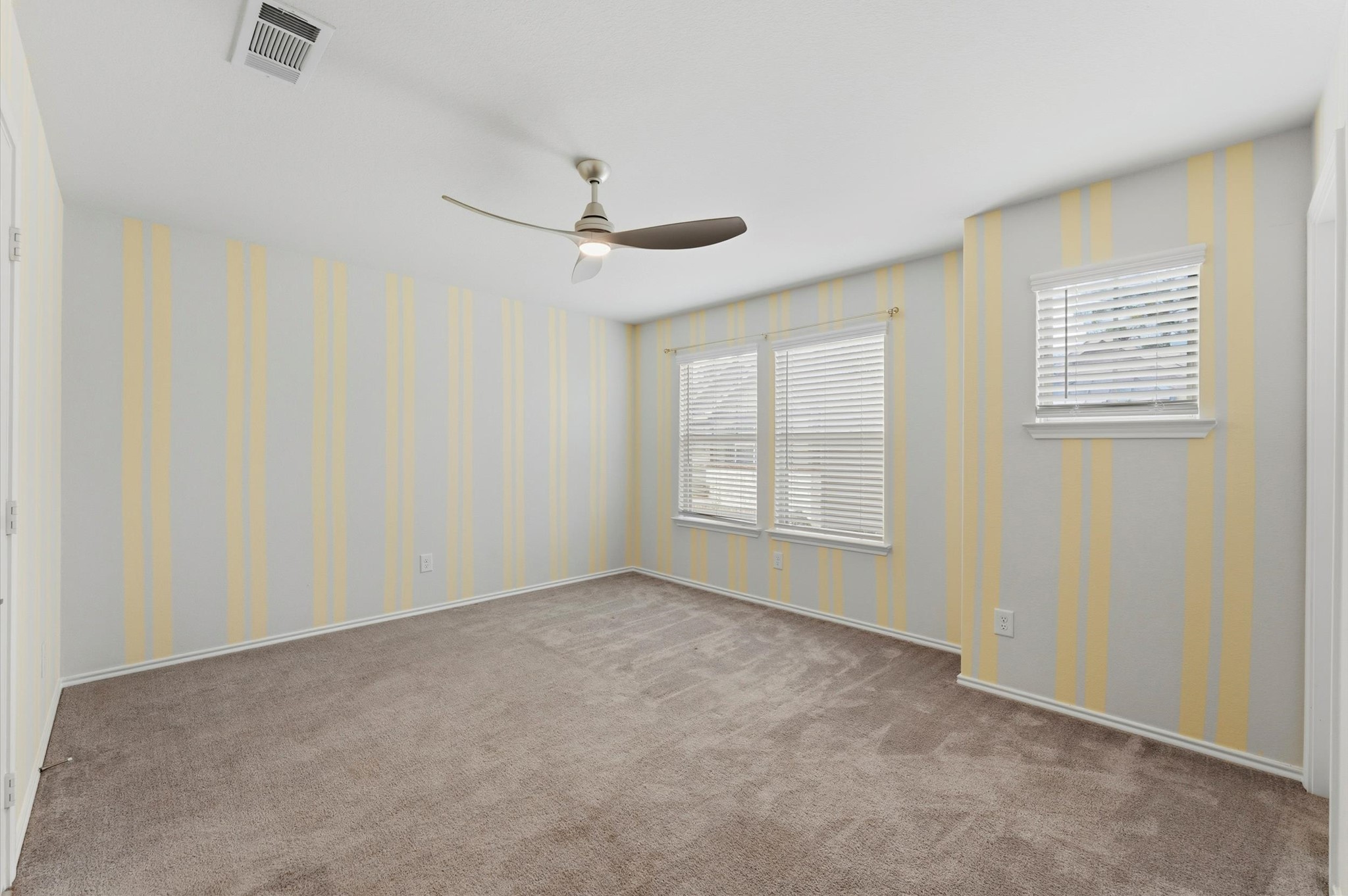 1822 Calabasas Way Houston, TX 77080 - Photo 25 of 32 an empty room with a empty space and windows