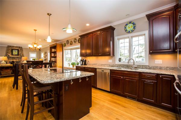 37 Marshall Road Wellesley, MA 02482 - Photo 11 of 23 a kitchen with granite countertop kitchen island stainless steel appliances a sink a counter top space cabinets and a window