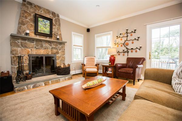 37 Marshall Road Wellesley, MA 02482 - Photo 9 of 23 a living room with furniture and a fireplace
