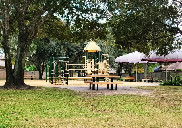 a swimming pool with outdoor seating and yard