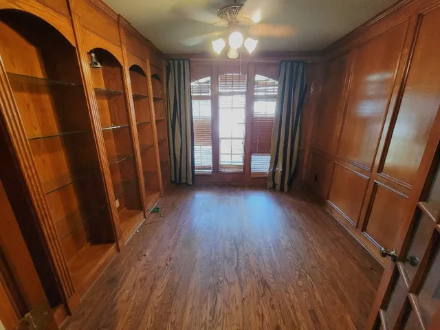 a view of entryway with wooden floor