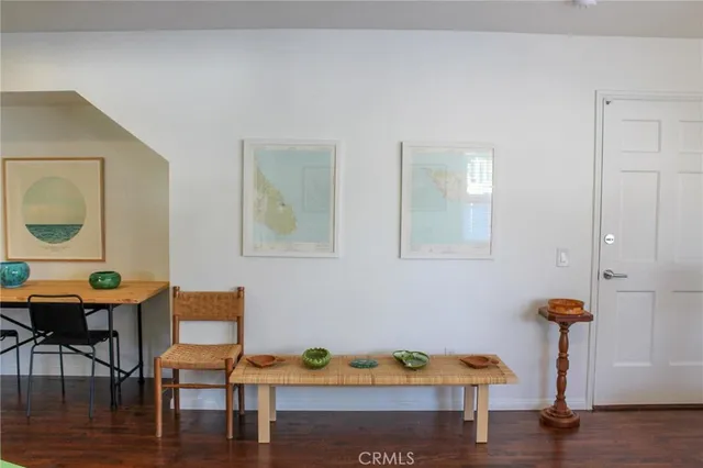a view of dining room with furniture and wooden floor