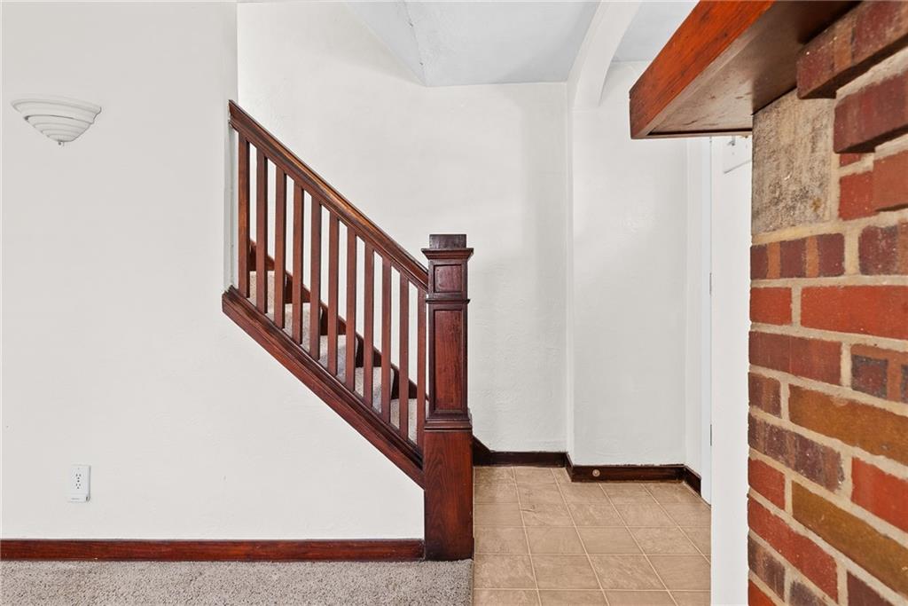 105 Kaplan Avenue Pittsburgh, PA 15227 - Photo 18 of 37 a view of staircase with white walls and a window