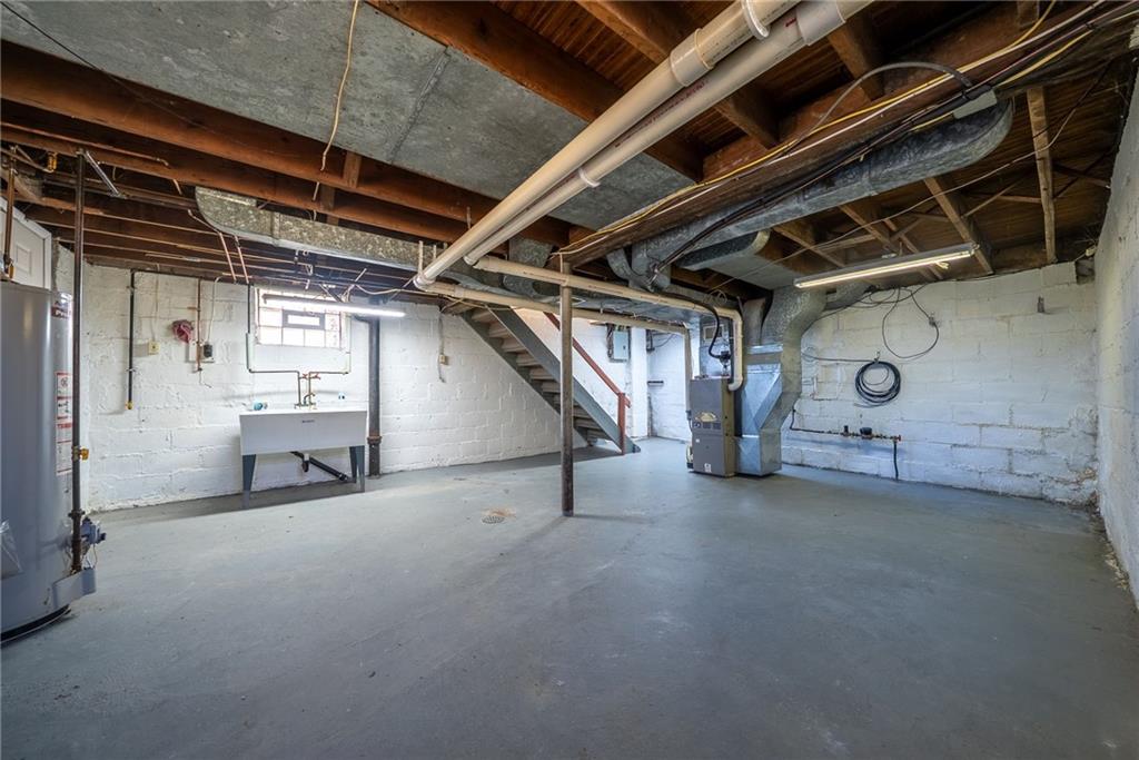 105 Kaplan Avenue Pittsburgh, PA 15227 - Photo 28 of 37 a view of an empty room with windows