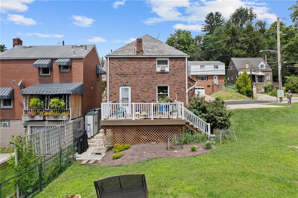 105 Kaplan Avenue Pittsburgh, PA 15227 - Photo 32 of 37 a view of a house with a yard and furniture