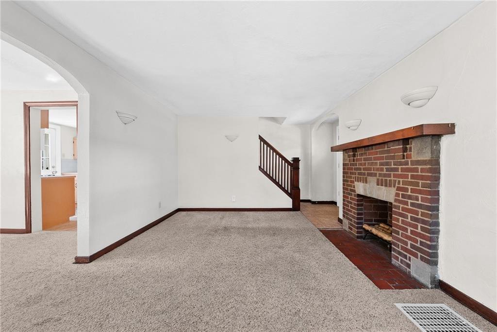 105 Kaplan Avenue Pittsburgh, PA 15227 - Photo 8 of 37 an empty room with windows