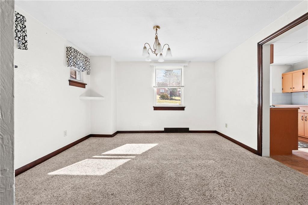 105 Kaplan Avenue Pittsburgh, PA 15227 - Photo 10 of 37 Large dining room off the kitchen.