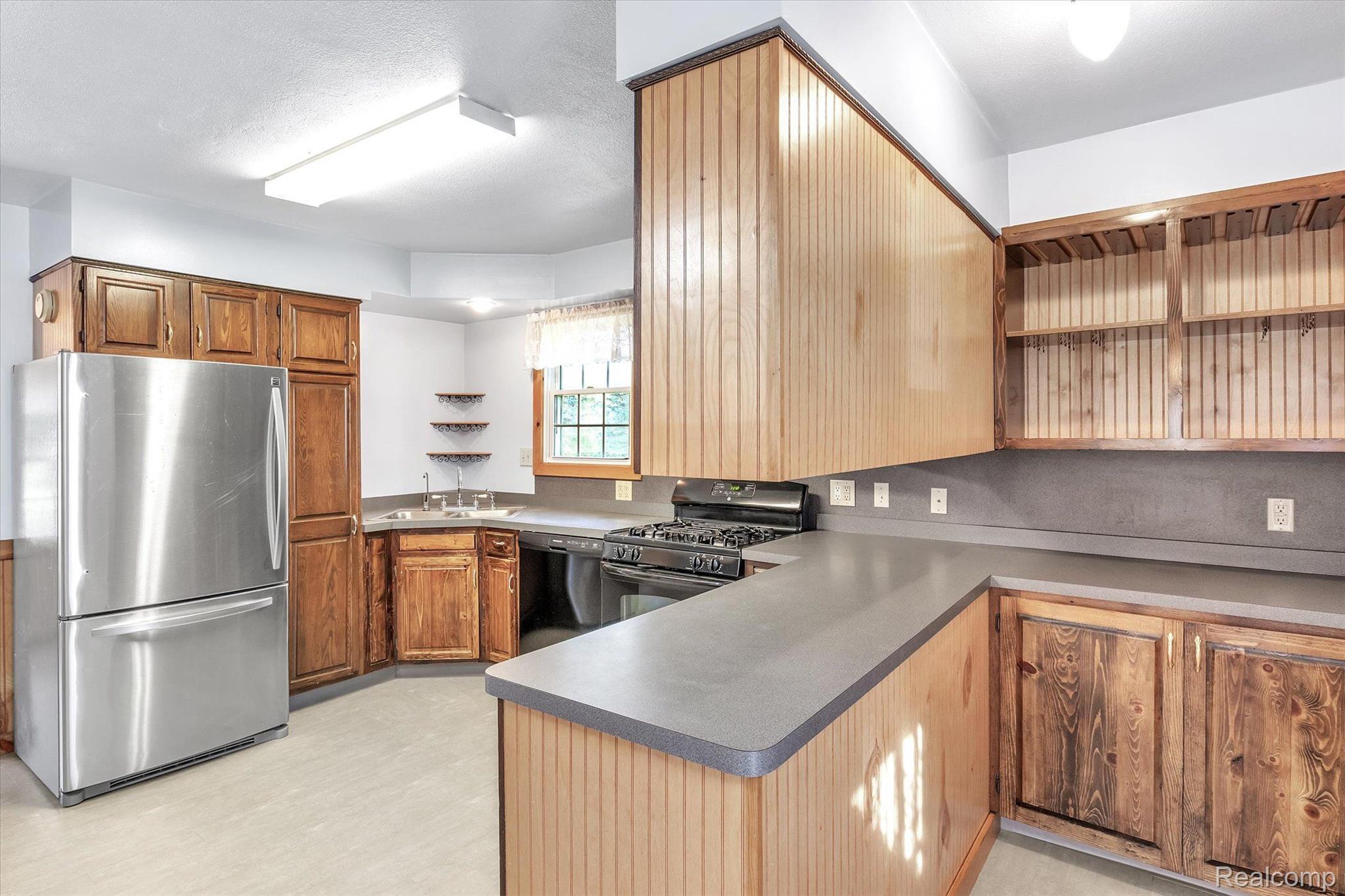 3310 Meridian Road Leslie, MI 49251 - Photo 11 of 49 Large kitchen with side nook.