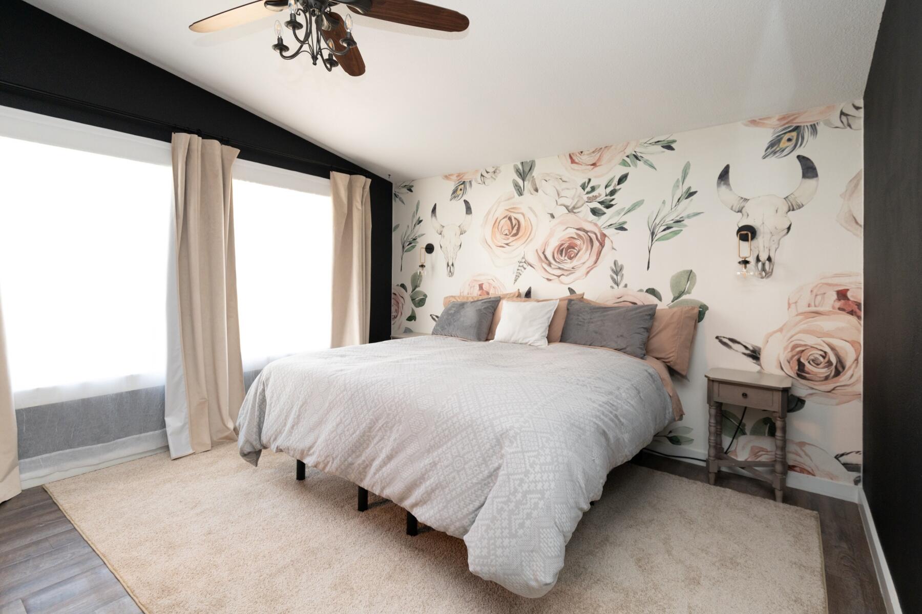16990 Covina Road Bend, OR 97707 - Photo 26 of 56 a bedroom with a bed and a window