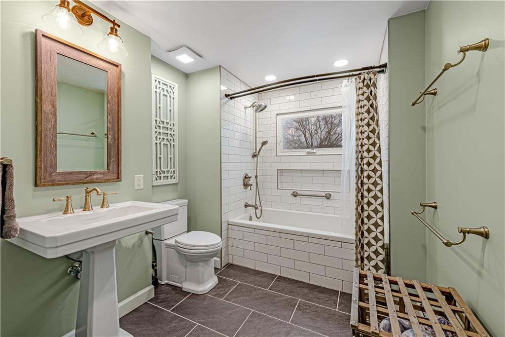 224 Kaufman Church Road Davidsville, PA 15928 - Photo 14 of 25 a bathroom with a sink a toilet and shower