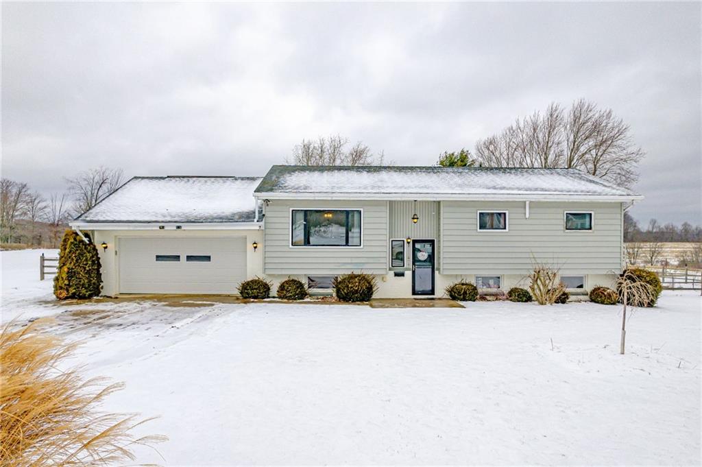 224 Kaufman Church Road Davidsville, PA 15928 - Photo 25 of 25 a view of a house with a snow in the background