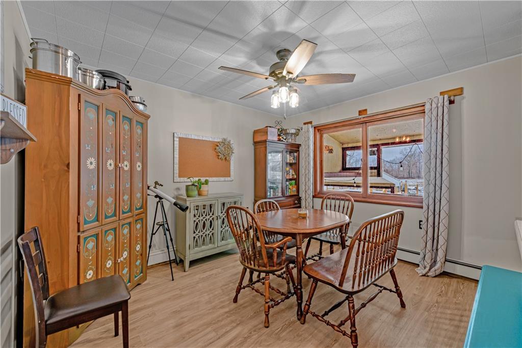 224 Kaufman Church Road Davidsville, PA 15928 - Photo 10 of 25 a view of a dining room with furniture window and wooden floor