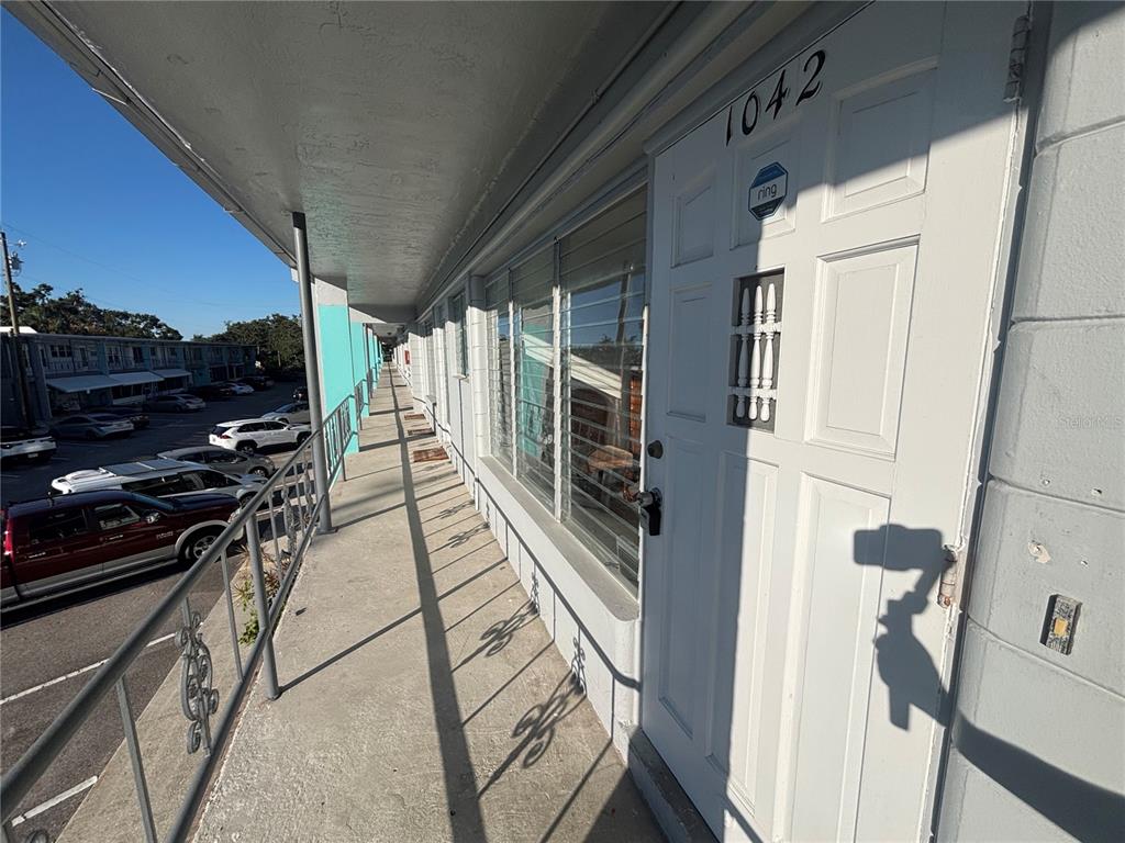 4061 55th Way North, Unit 1042 Kenneth City, FL 33709 - Photo 1 of 18 a view of an outdoor space
