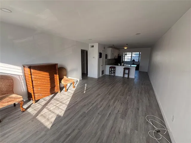 a view of a living room and dining room