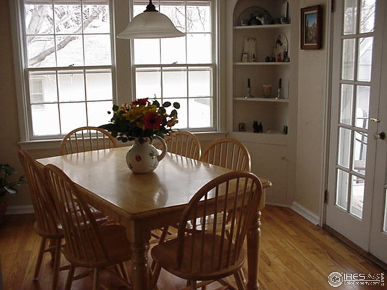 409 East Prospect Road Fort Collins, CO 80525 - Photo 3 of 10 a view of a dining room with furniture and window