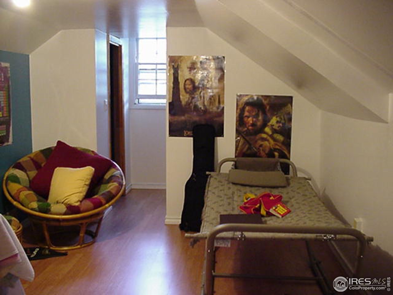 409 East Prospect Road Fort Collins, CO 80525 - Photo 8 of 10 a room with furniture and musical instruments