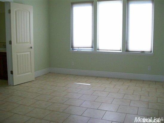 20552 Buchanan Hollow Road, Unit 1 Le Grand, CA 95333 - Photo 19 of 26 a view of a room that has a window in it