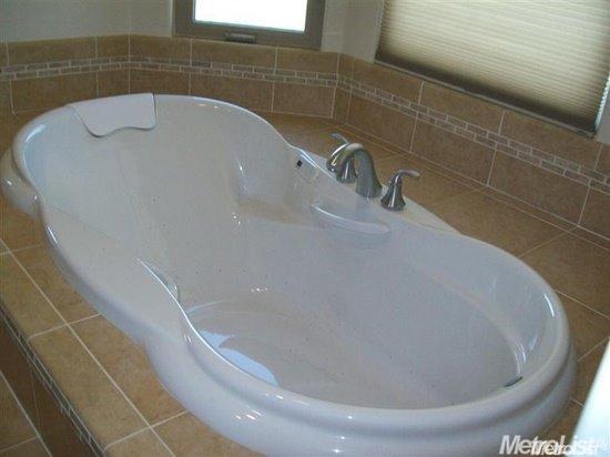 20552 Buchanan Hollow Road, Unit 1 Le Grand, CA 95333 - Photo 22 of 26 a close view of a bathtub in a bathroom