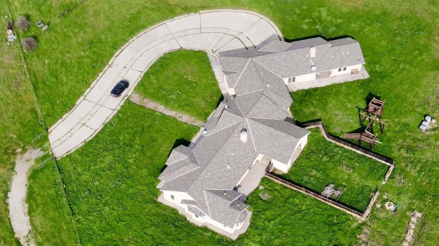 20552 Buchanan Hollow Road, Unit 1 Le Grand, CA 95333 - Photo 5 of 26 an aerial view of a house