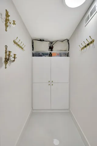 a view of a city with lawn chairs