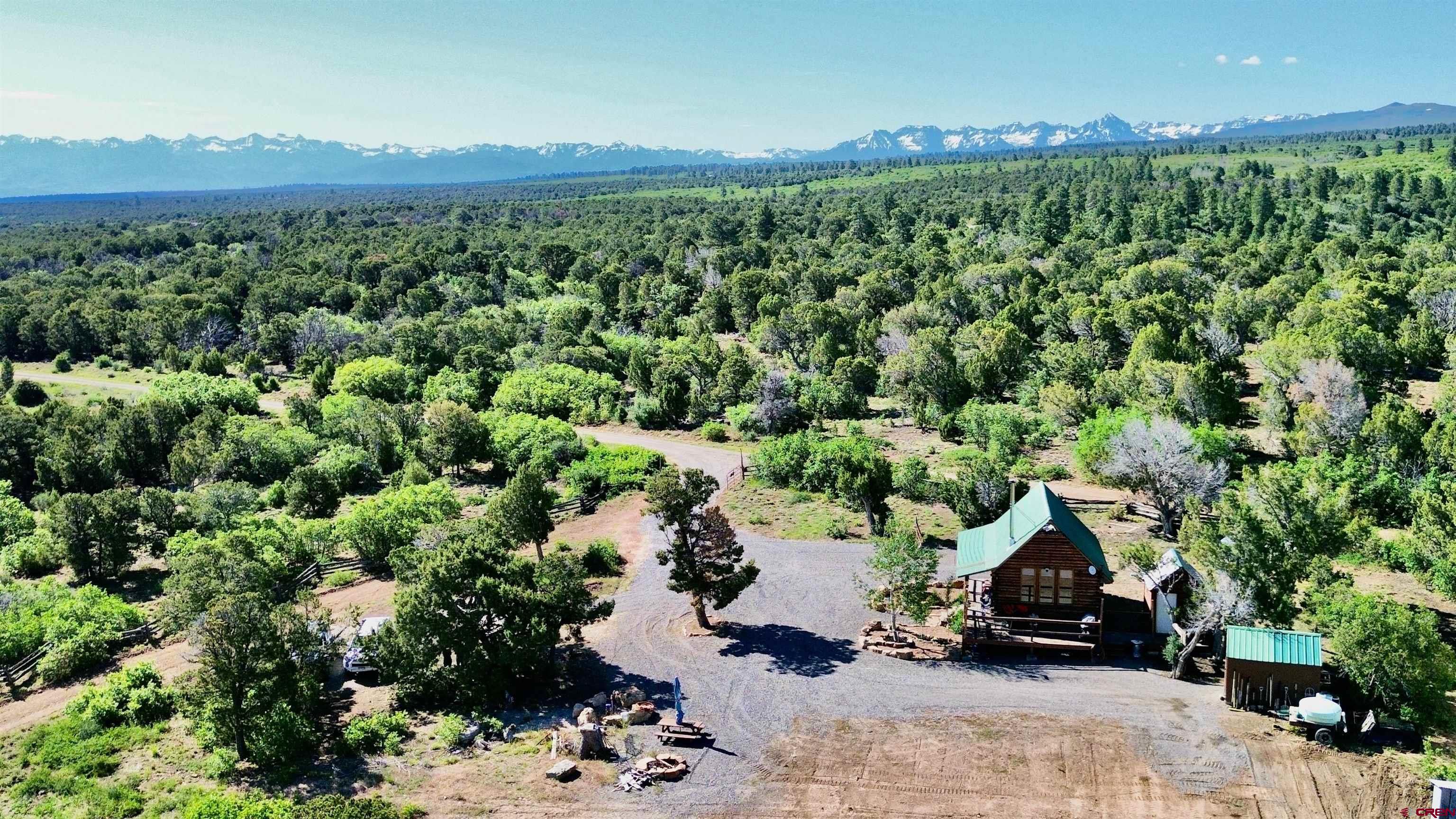 1165 Timber Ridge Road Montrose, CO 81403 - Photo 2 of 44 a view of a back yard