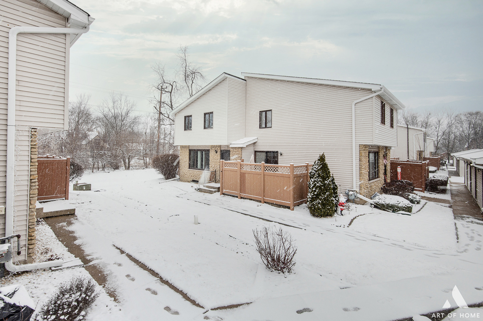 a view of a terrace with a snow on the wall