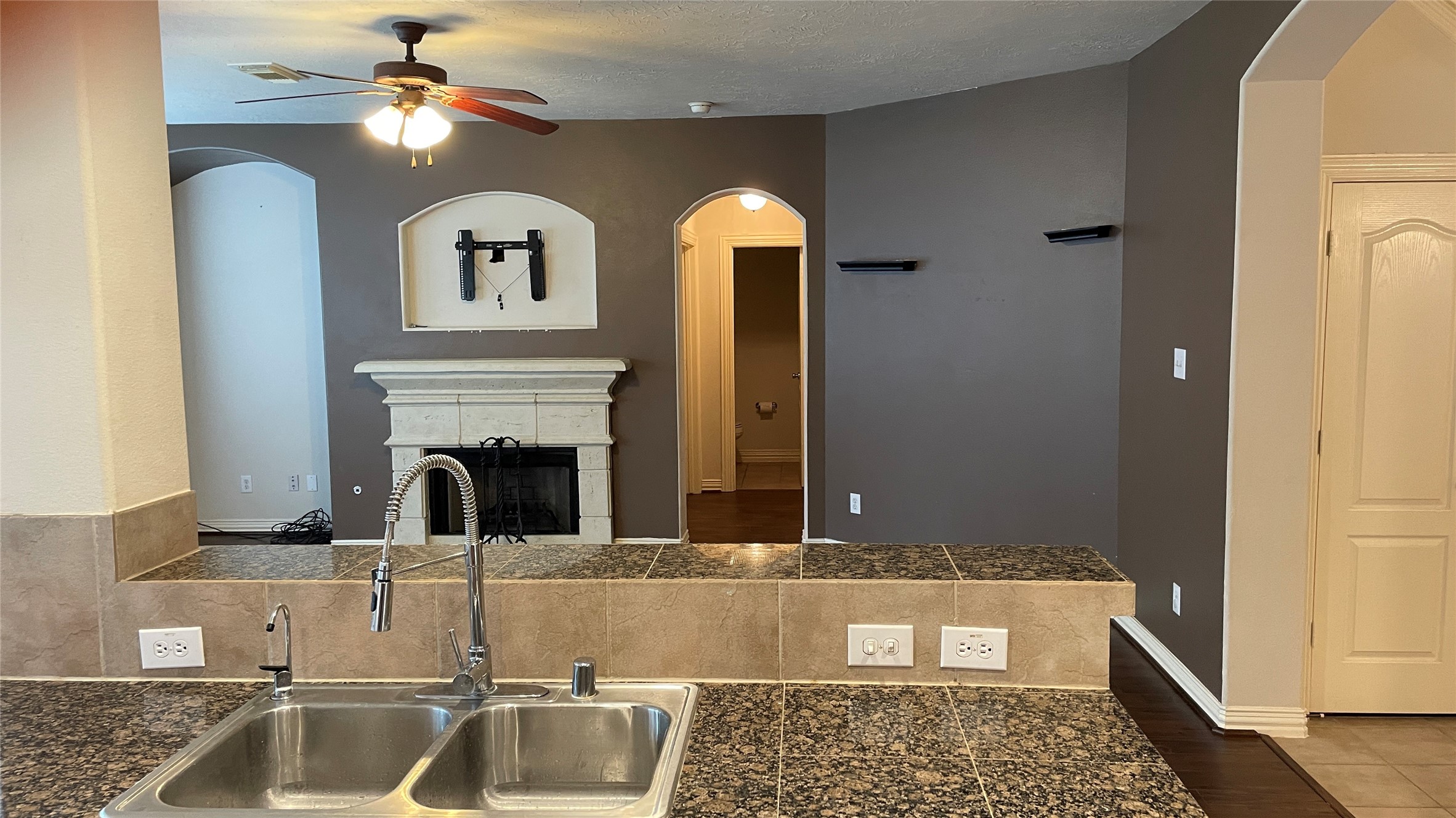 3518 Ewing Drive Manvel, TX 77578 - Photo 16 of 50 a view of a kitchen with a sink and chandelier