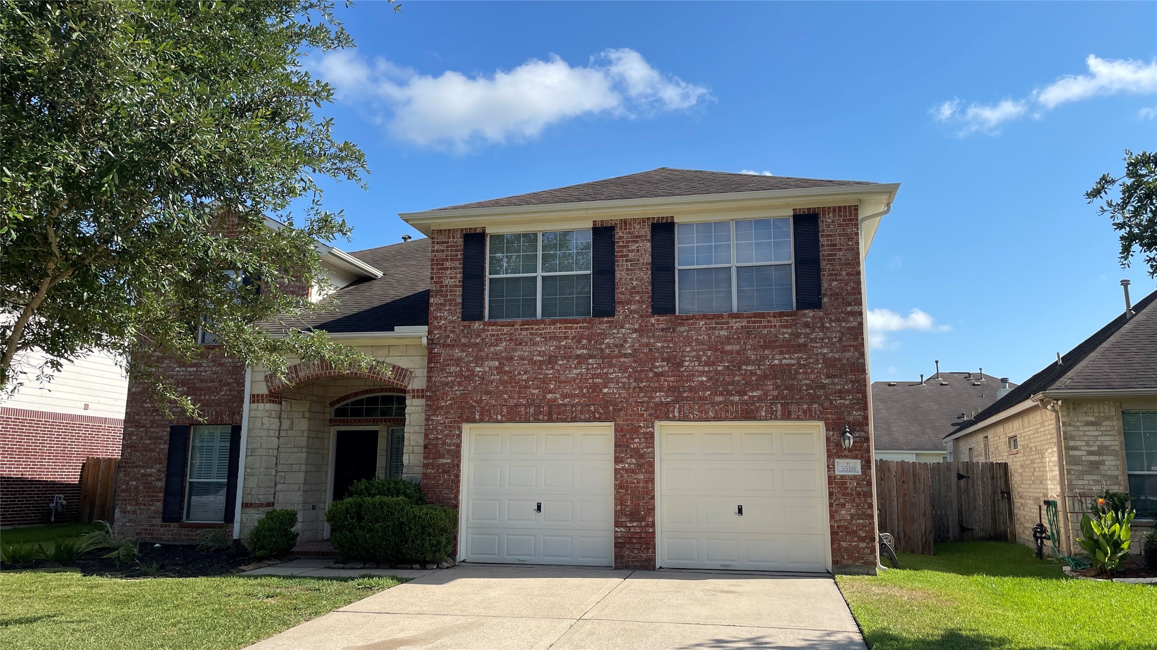 3518 Ewing Drive Manvel, TX 77578 - Photo 2 of 50 a front view of a house with a yard