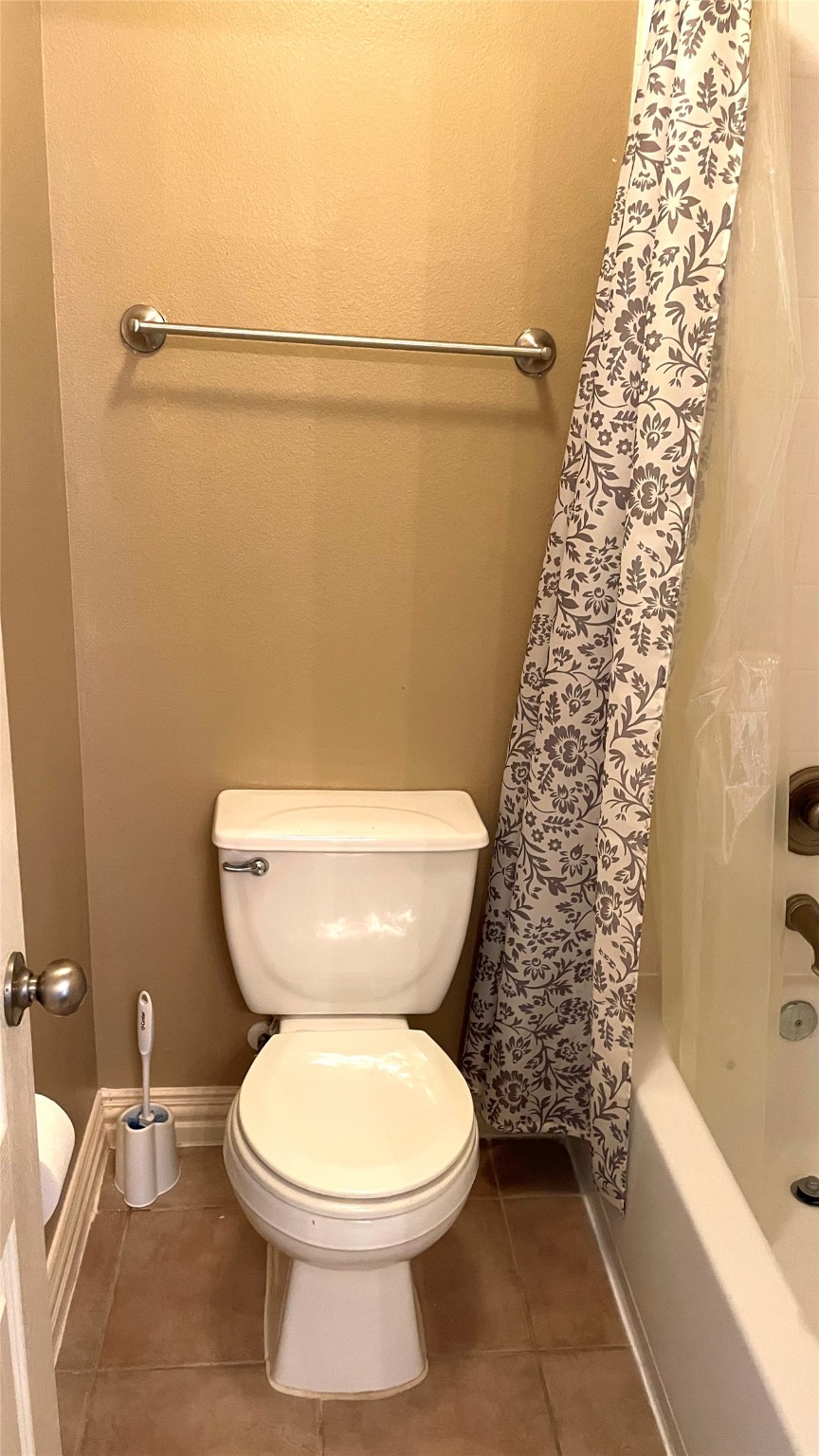 3518 Ewing Drive Manvel, TX 77578 - Photo 45 of 50 a bathroom with a toilet and a shower curtain