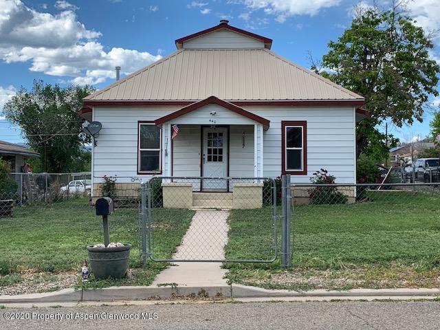 440 East 2nd Street Rifle, CO 81650 - Photo 1 of 29 a front view of a house with a yard