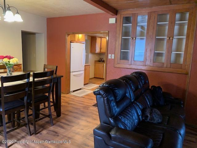 440 East 2nd Street Rifle, CO 81650 - Photo 8 of 29 a living room with furniture and wooden floor