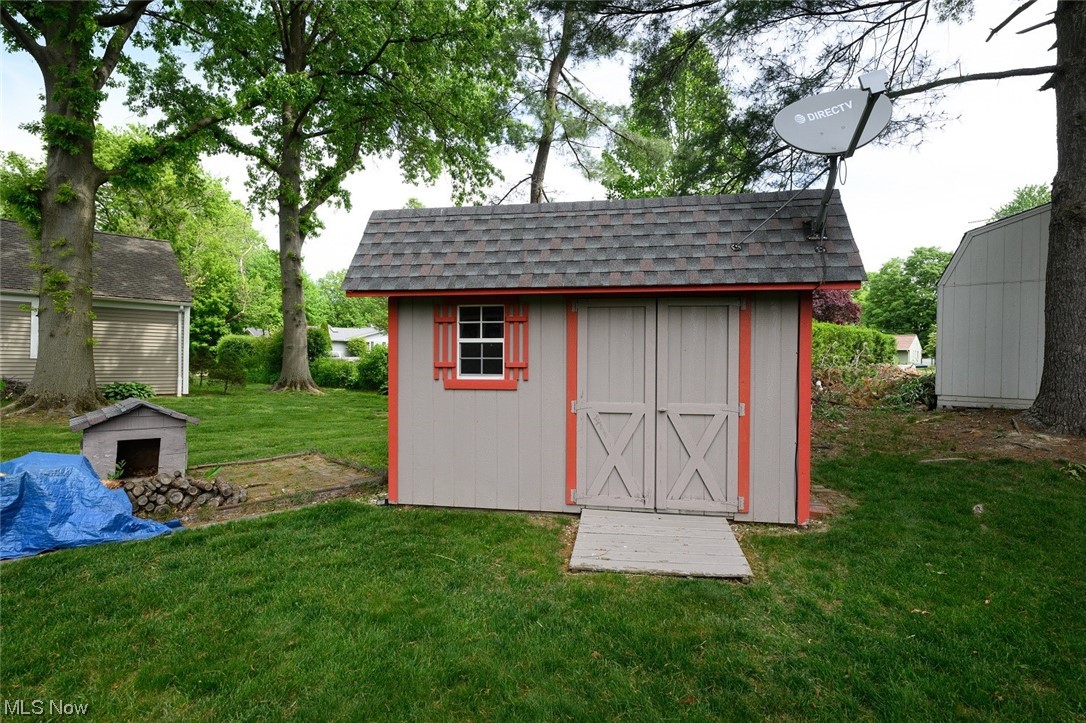 572 Overwood Road Akron, OH 44313 - Photo 7 of 35 View of shed / structure and a lawn
