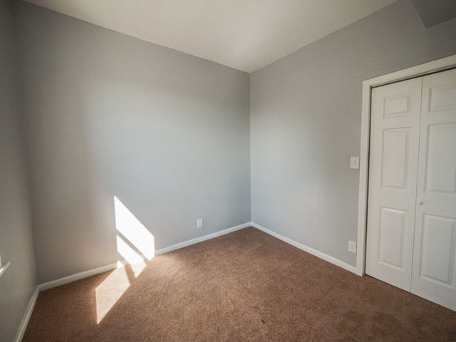 6849 South Green Street, Unit 1 Chicago, IL 60621 - Photo 7 of 7 a view of an empty room
