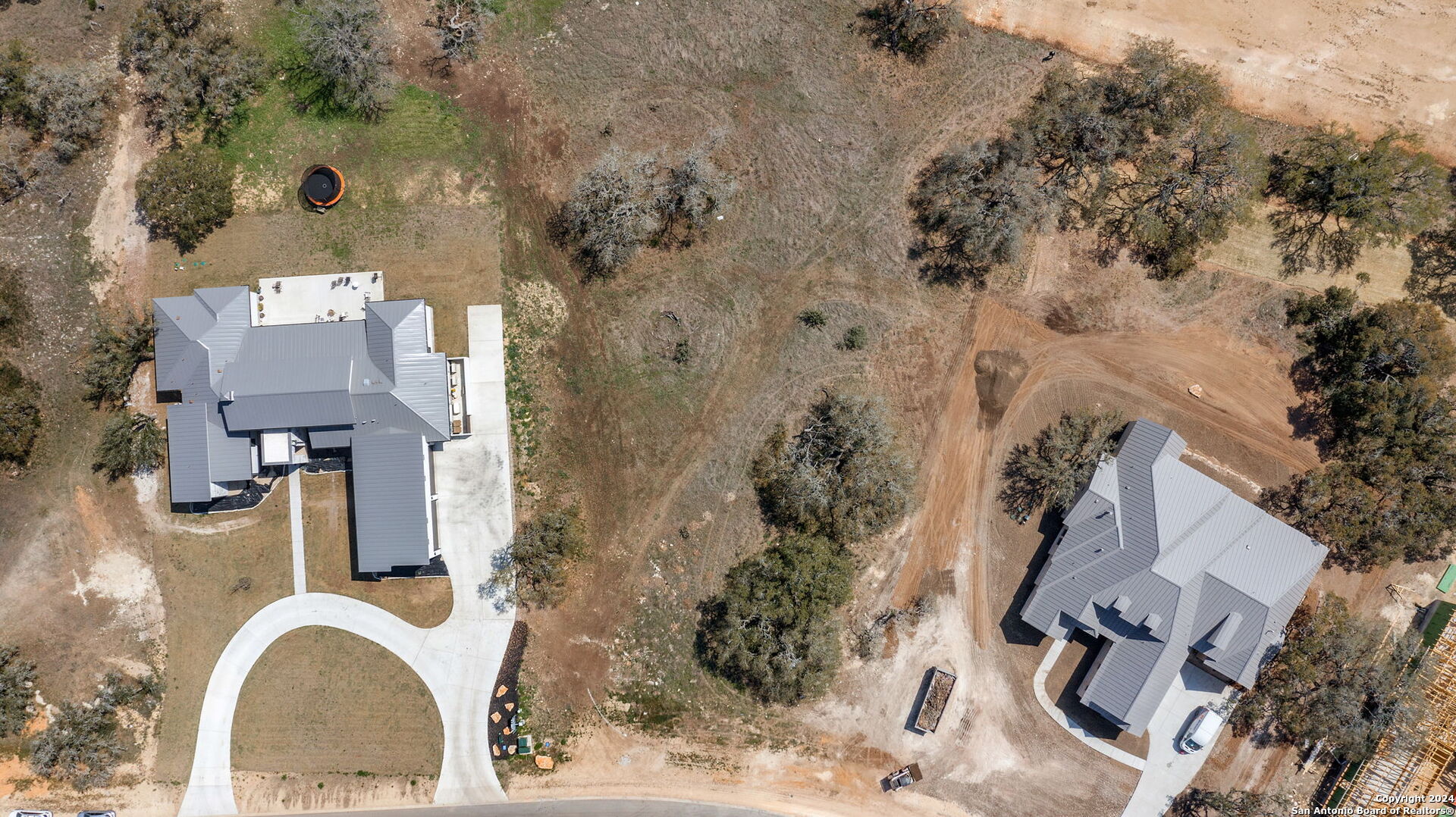 979 Maximino Rdg Road Bulverde, TX 78163 - Photo 7 of 14 an aerial view of a house with a yard