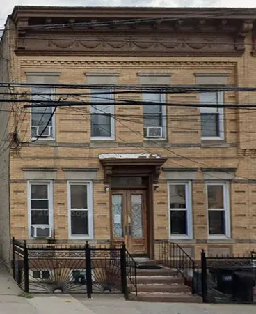 a front view of a house with a porch