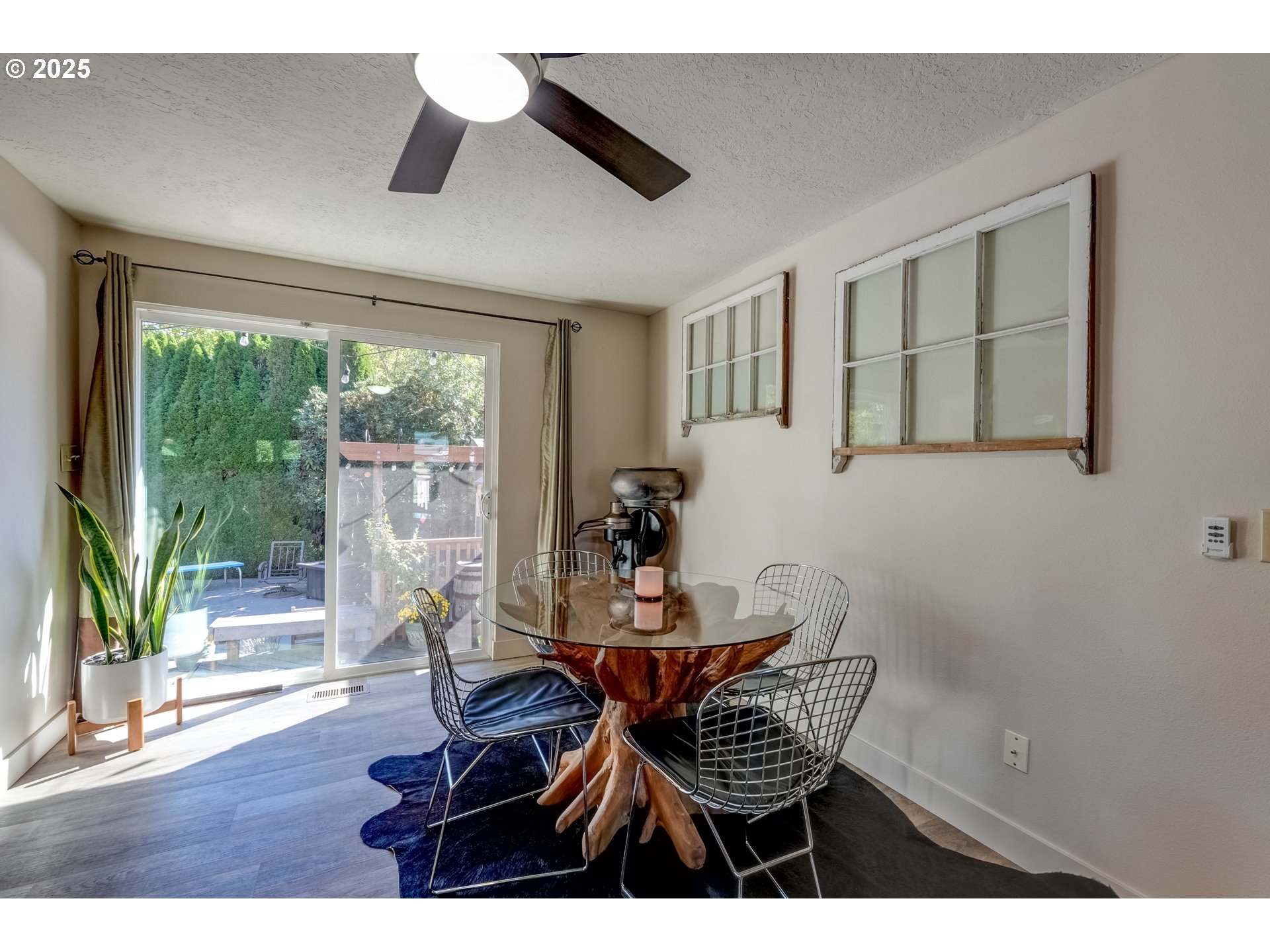 1421 Southwest 6th Place Gresham, OR 97080 - Photo 14 of 27 a dining room with furniture and wooden floor