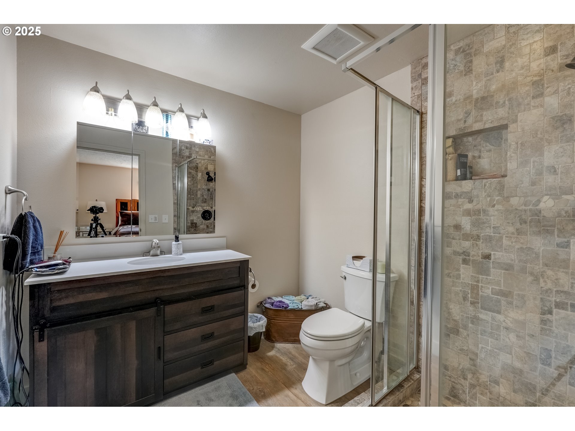 1421 Southwest 6th Place Gresham, OR 97080 - Photo 16 of 27 a bathroom with a sink a toilet a mirror and shower