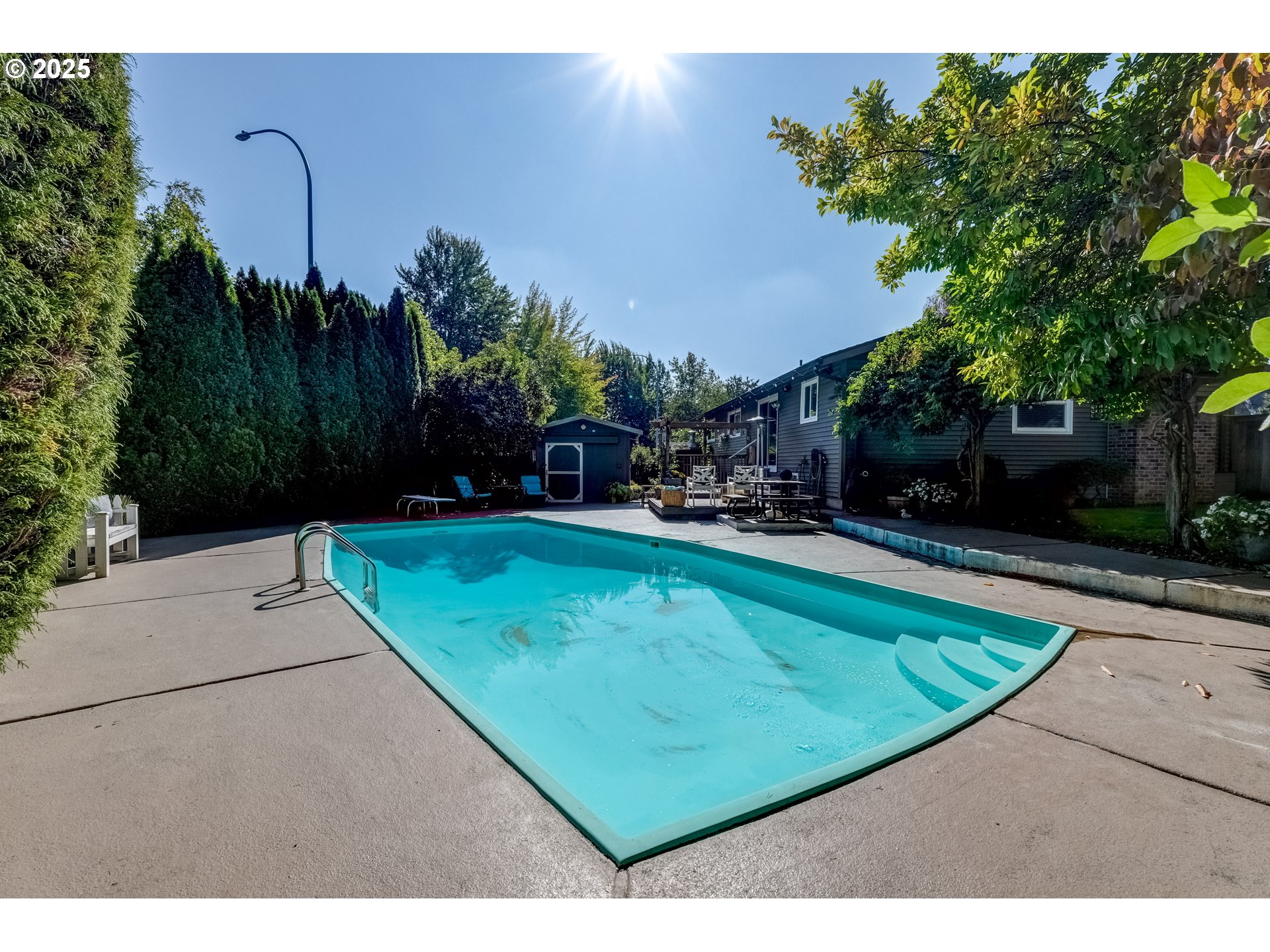 1421 Southwest 6th Place Gresham, OR 97080 - Photo 24 of 27 a view of a swimming pool with a yard