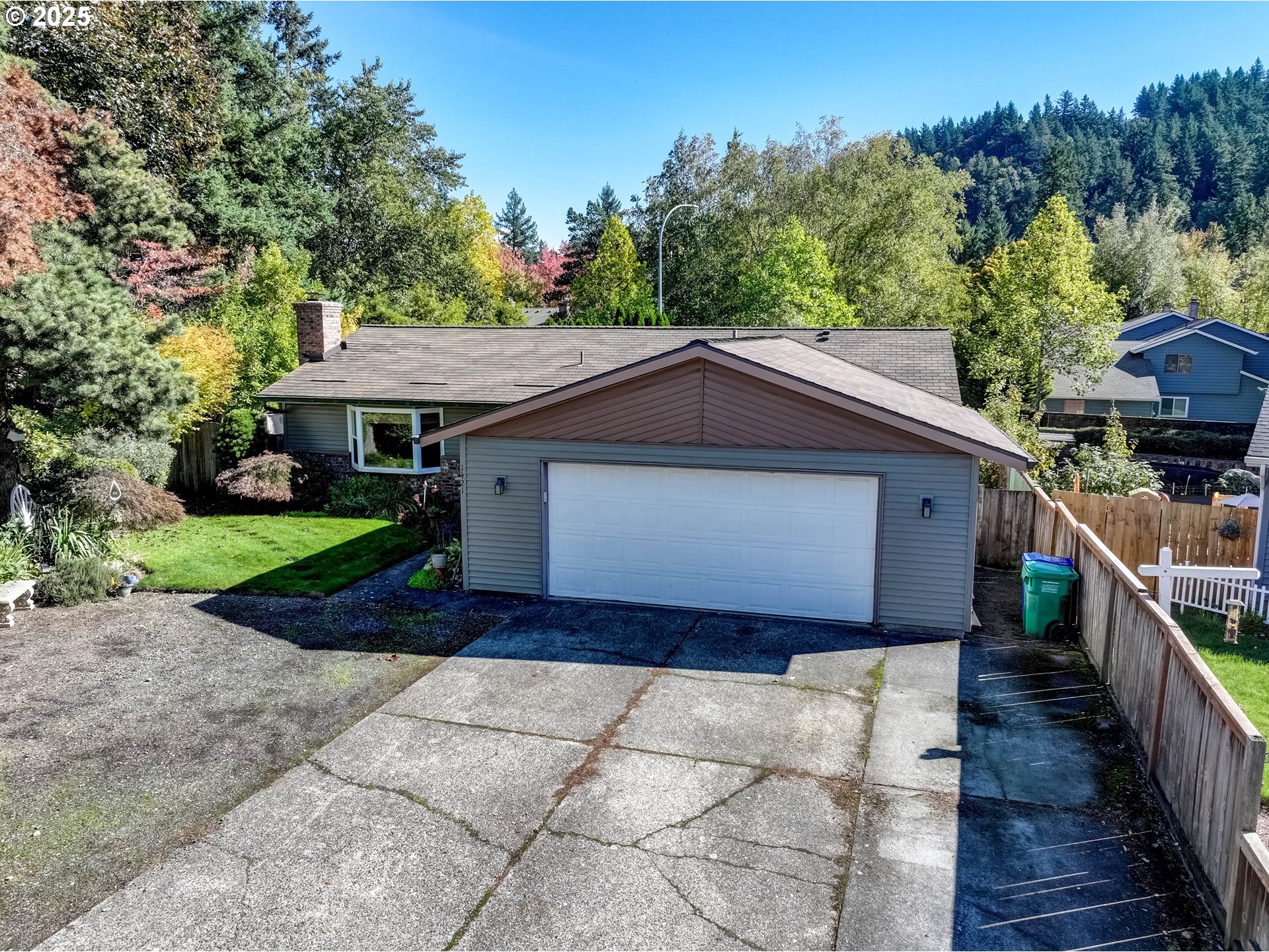 1421 Southwest 6th Place Gresham, OR 97080 - Photo 3 of 27 a house with trees in the background