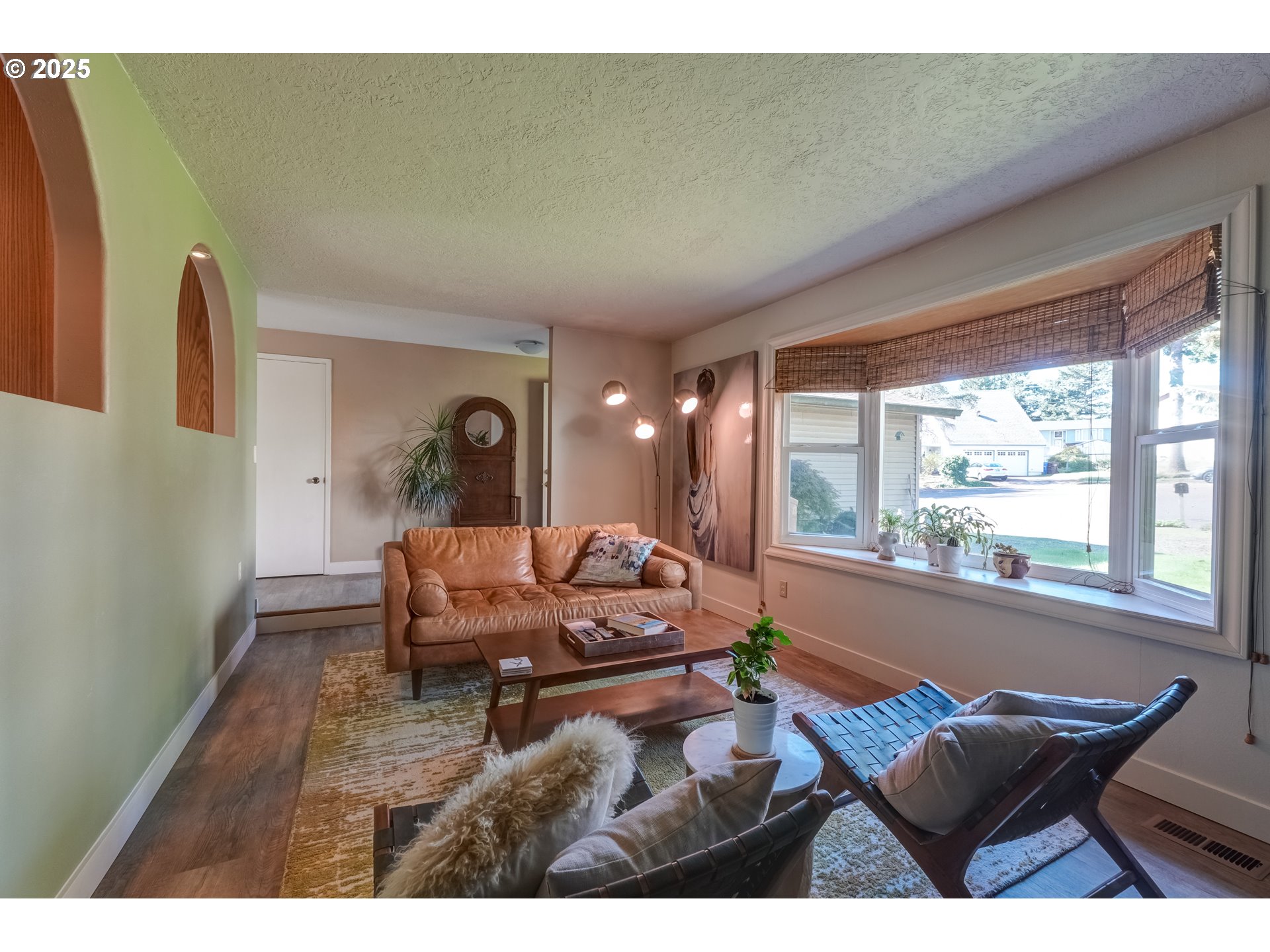 1421 Southwest 6th Place Gresham, OR 97080 - Photo 7 of 27 a living room with furniture and a window