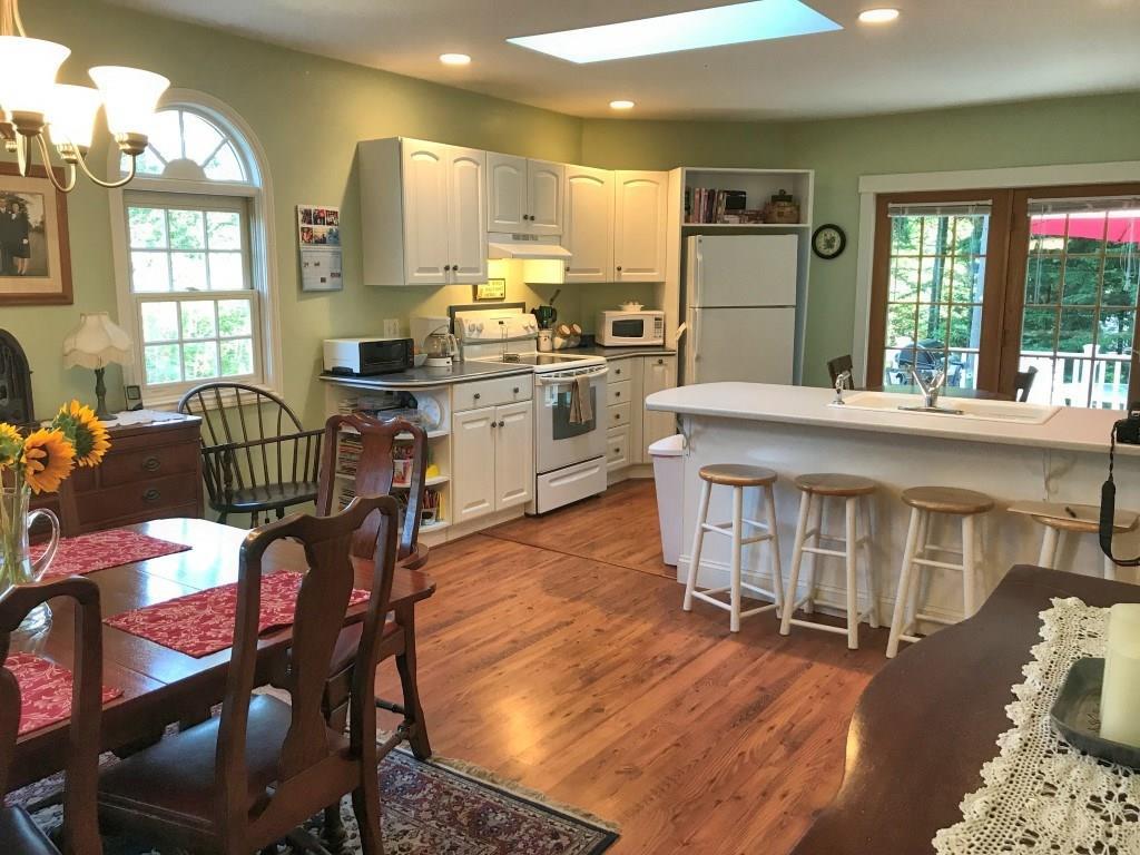 24 Jason Circle Boothbay, ME 04537 - Photo 2 of 14 The kitchen with laminate cabinets...
