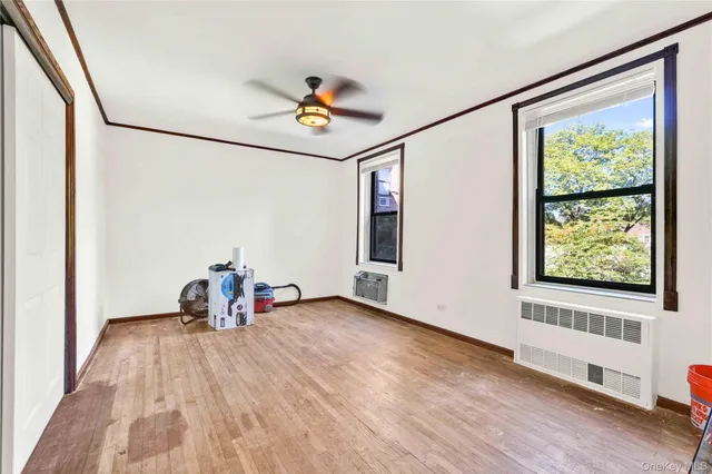 a view of livingroom with furniture and a window