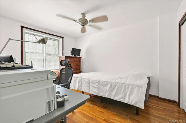 a room with bed and window