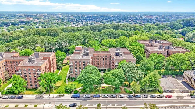 an aerial view of a house with a garden