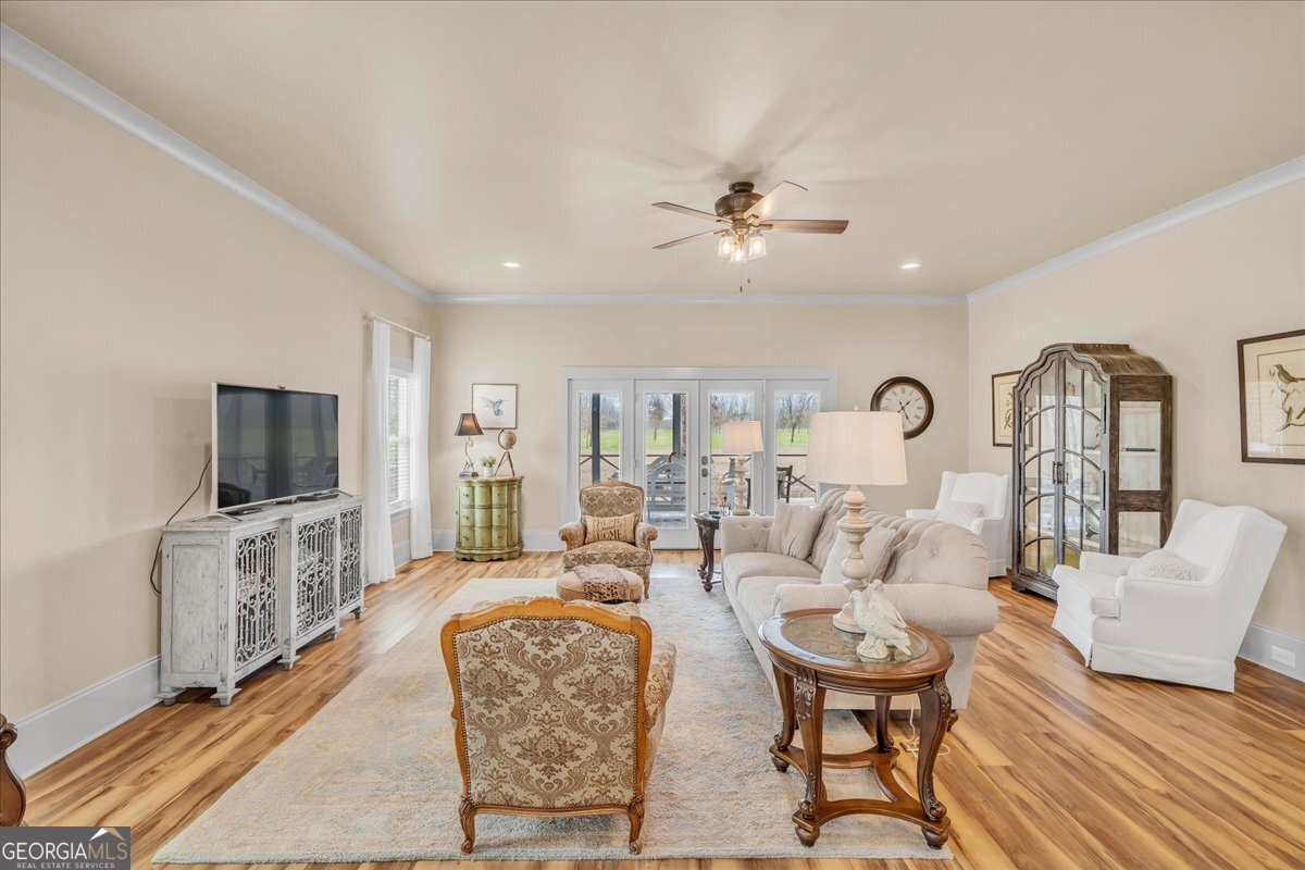117 Pine Bough Trail Perry, GA 31069 - Photo 15 of 83 a living room with furniture a flat screen tv and a fireplace