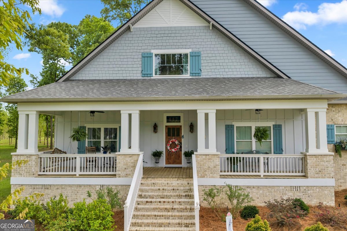 117 Pine Bough Trail Perry, GA 31069 - Photo 2 of 83 front view of a house with a porch