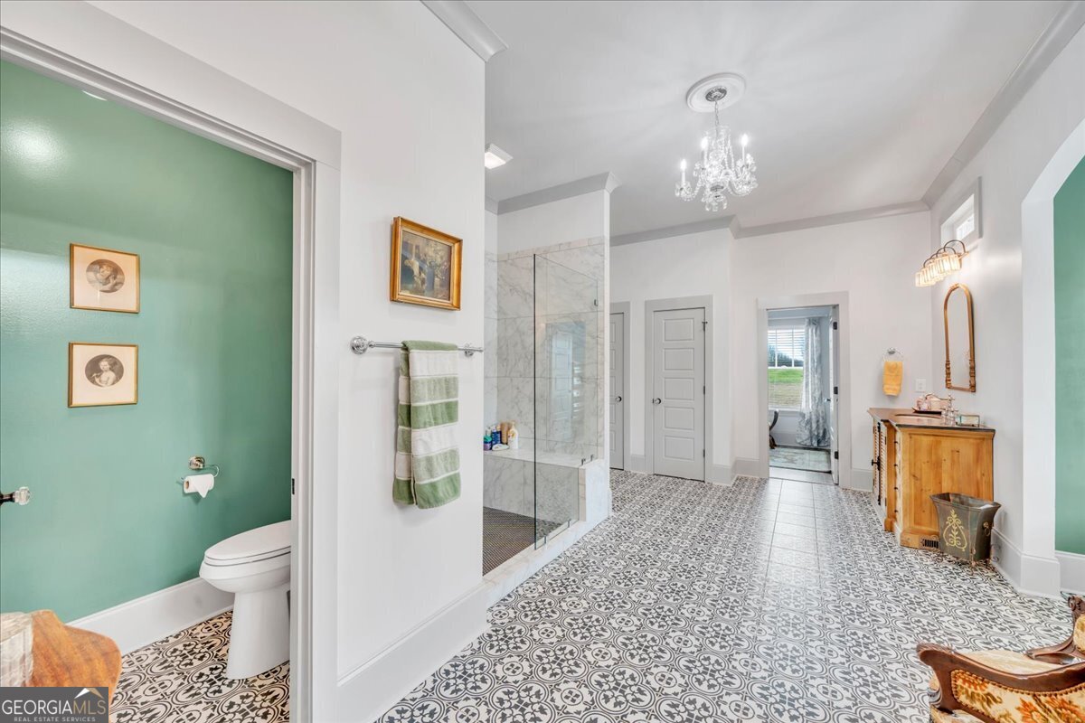 117 Pine Bough Trail Perry, GA 31069 - Photo 28 of 83 a spacious bathroom with a sink a toilet and shower