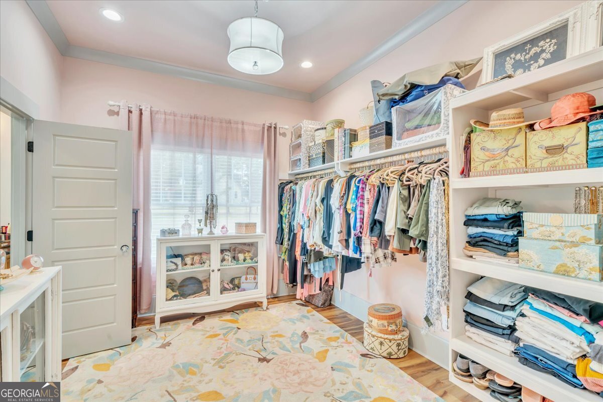 117 Pine Bough Trail Perry, GA 31069 - Photo 33 of 83 a view of a bedroom with shelves